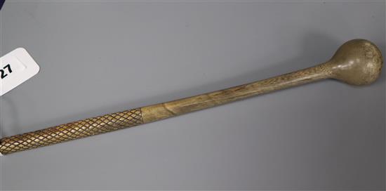 A South Asian rhinoceros horn gong beater